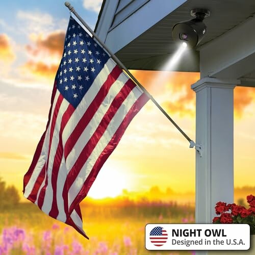 American flag on porch at sunset with security camera.