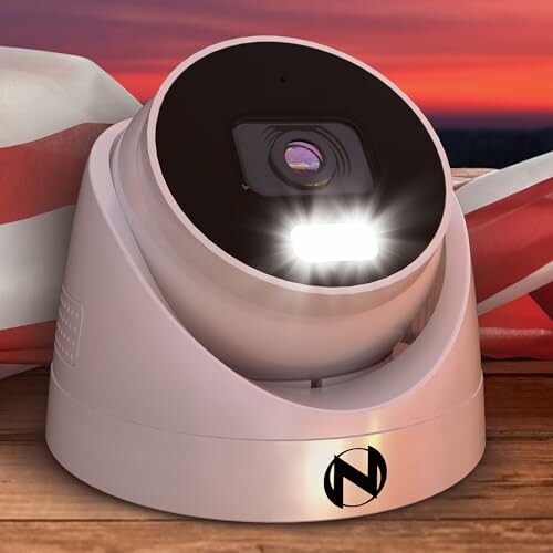 Security camera on a table with a sunset background