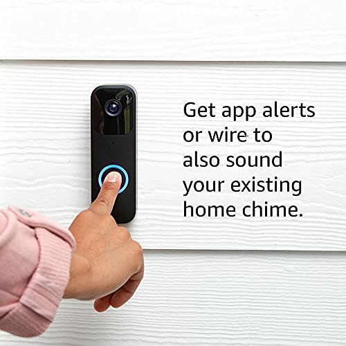 Person pressing smart doorbell button with text about app alerts and wiring options.